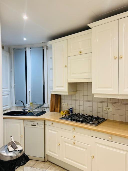Au Pied De La Tour Eiffel Apartment Париж Екстериор снимка